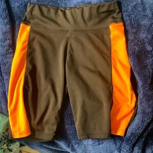 Black and orange biker shorts